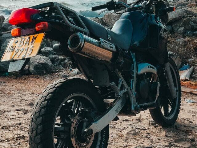 Honda AX-1 motorbike by the sea